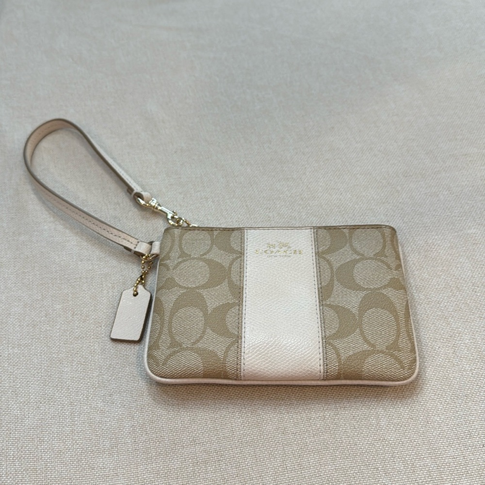 Coach Tan and White Clutch with Signature Monogram